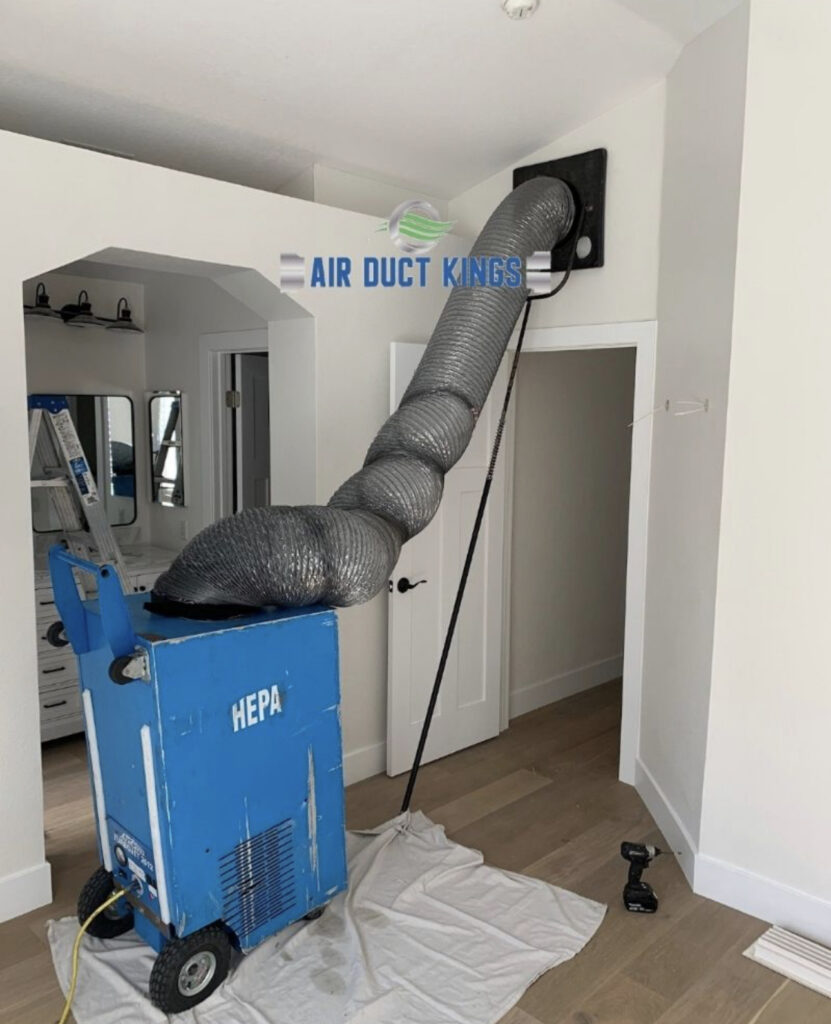 Air Duct Kings technician cleaning ducts in Foothill Ranch