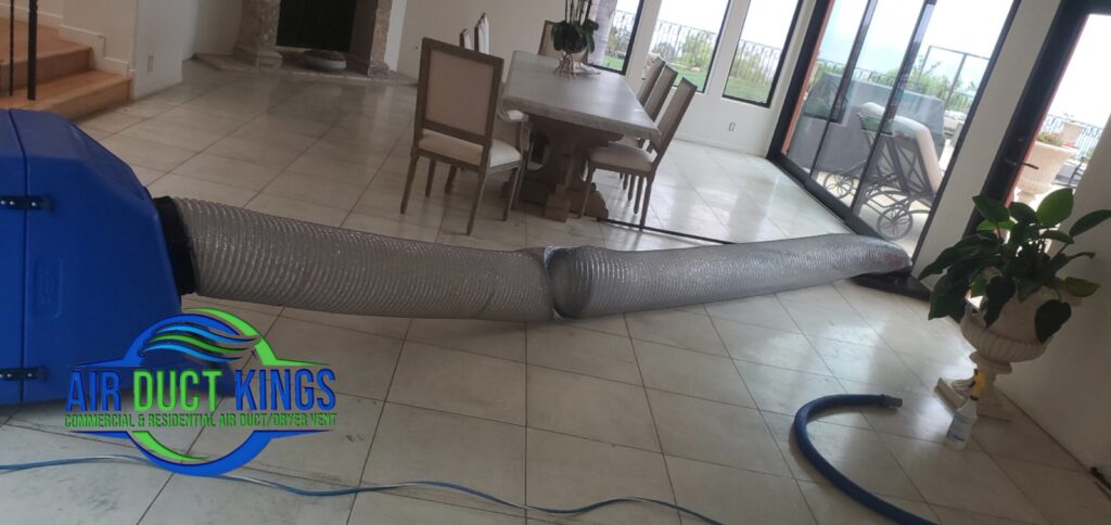 Flexible air duct running through an Orange County home during duct work