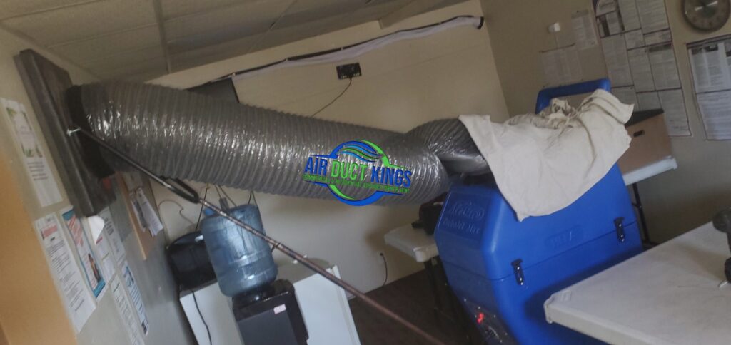 Air duct equipment working inside an Orange County home